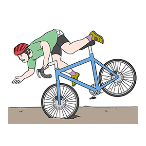 Ein Fahrradfahrer bei einem Sturz vom Rad.
